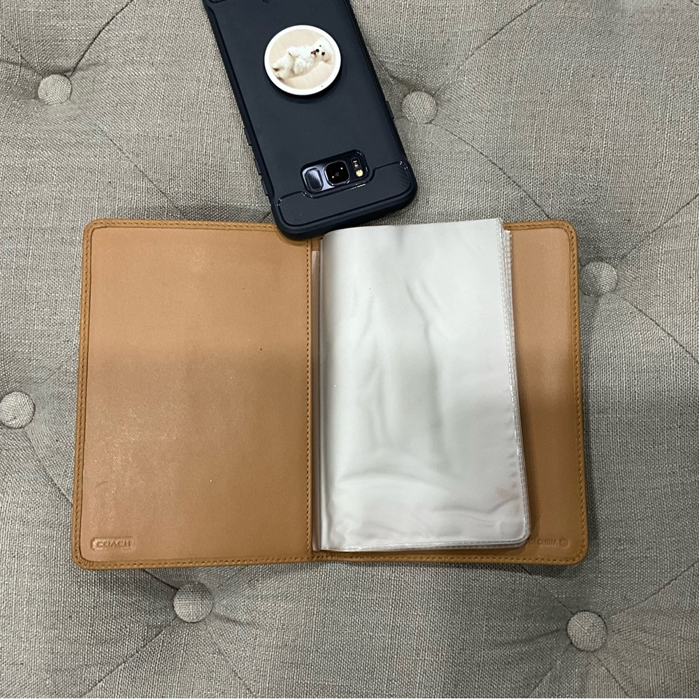 Coach beige 4x6 photo book. Leather and never used.